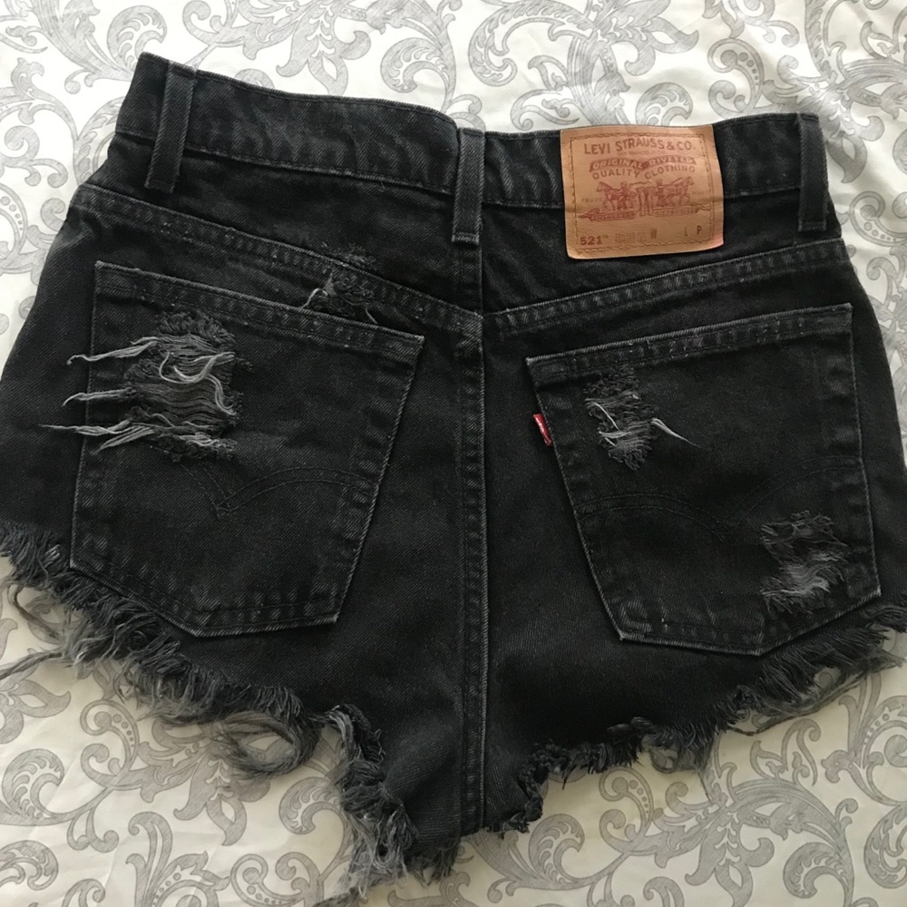 Black Levi’s 521s size 10 distressed shorts
